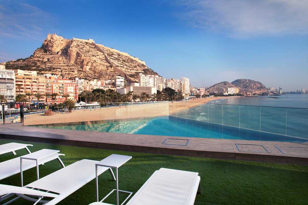 Melia Alicante Hotel a view of the beach from the swimming pool of the Melia Alicante